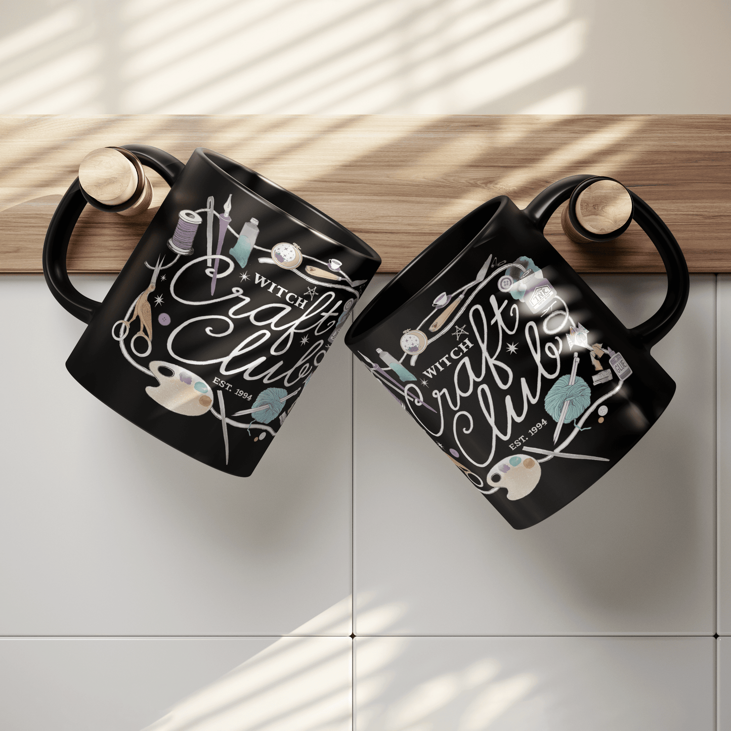 Witch_Craft_Club_-_11oz_Black_Mug_Lifestyle_Hanging_Mugs_Mockup.png