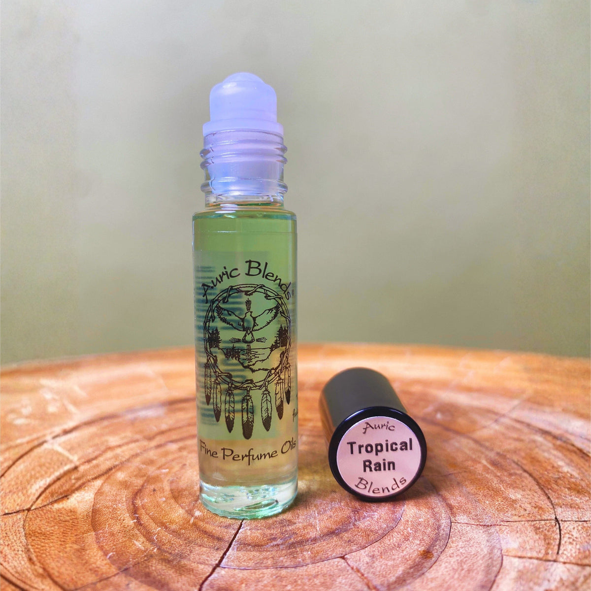 Tropical Rain Roll-on Perfume Oil - Leafy Greens & Blonde Woods
